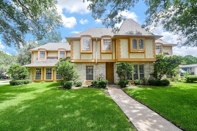 2622 Williams Grant St, Sugar Land, TX 77479 - view of front of house featuring a front lawn and stucco siding