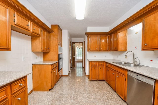 2622 Williams Grant St, Sugar Land, TX 77479 - kitchen with dishwasher, light countertops, tasteful backsplash, black oven, and brown cabinetry