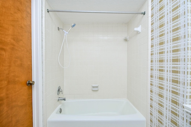 2622 Williams Grant St, Sugar Land, TX 77479 - bathroom featuring washtub / shower combination
