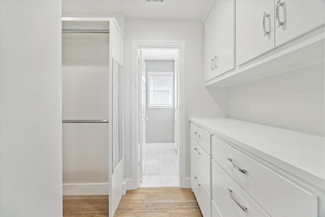 4530 T C Jester Blvd, Houston, TX 77018 - kitchen featuring white cabinets and light countertops