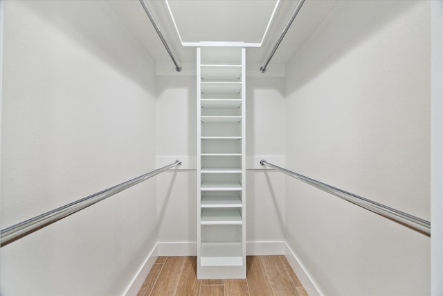 4530 T C Jester Blvd, Houston, TX 77018 - walk in closet with light wood finished floors