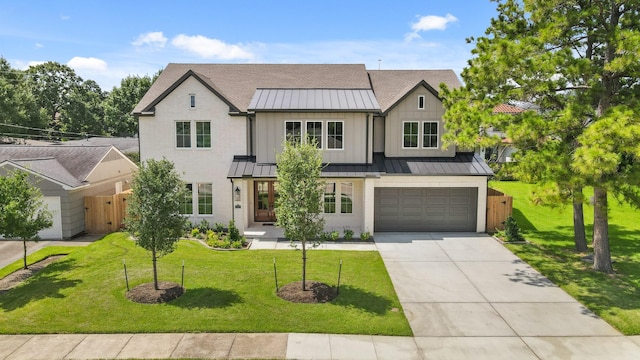 5317 Schumacher Ln, Houston, TX 77056 - view of front of house with a standing seam roof, concrete driveway, a metal roof, board and batten siding, and a garage