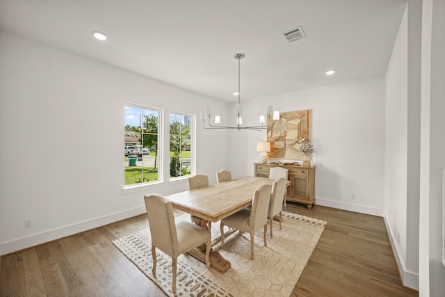 5317 Schumacher Ln, Houston, TX 77056 - dining room with a chandelier, wood finished floors, and recessed lighting