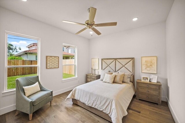 5317 Schumacher Ln, Houston, TX 77056 - bedroom with multiple windows, wood finished floors, and recessed lighting