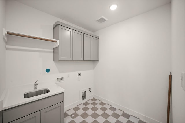 5317 Schumacher Ln, Houston, TX 77056 - washroom with hookup for an electric dryer, hookup for a washing machine, cabinet space, light flooring, and recessed lighting