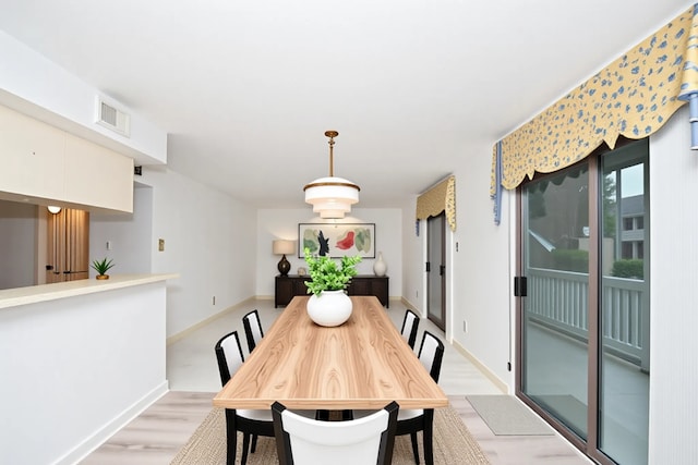 14911 Wunderlich Dr Unit 211, Houston, TX 77069 - dining room featuring light wood finished floors and baseboards