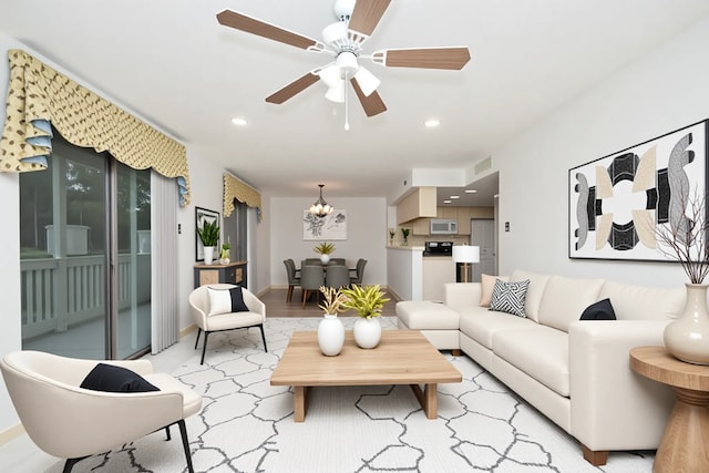 14911 Wunderlich Dr Unit 211, Houston, TX 77069 - living area with a ceiling fan, recessed lighting, and a chandelier