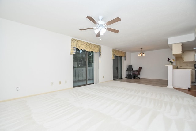 14911 Wunderlich Dr Unit 211, Houston, TX 77069 - unfurnished living room featuring a ceiling fan, a desk, a chandelier, and carpet floors
