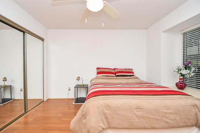 14911 Wunderlich Dr Unit 211, Houston, TX 77069 - bedroom with wood finished floors, a closet, and ceiling fan
