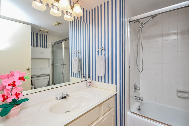 14911 Wunderlich Dr Unit 211, Houston, TX 77069 - bathroom with vanity, wallpapered walls, and shower / tub combination