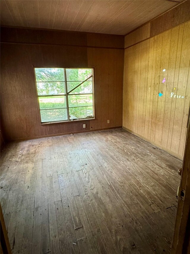 193 Corry Jones, Livingston, TX 77351 - spare room with hardwood / wood-style floors, wood walls, and wood ceiling
