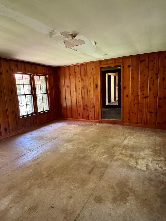 193 Corry Jones, Livingston, TX 77351 - spare room featuring wood walls