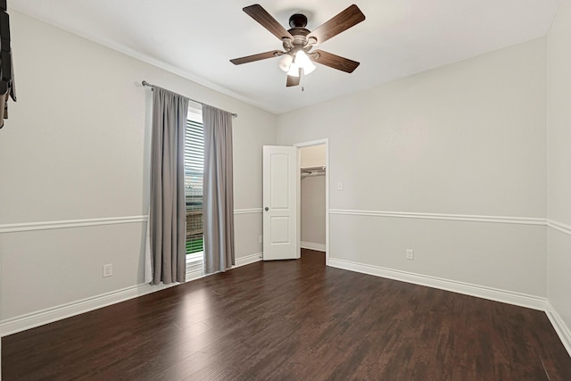 20010 Barrow Edge Ln, Cypress, TX 77433 - spare room with dark wood finished floors and a ceiling fan