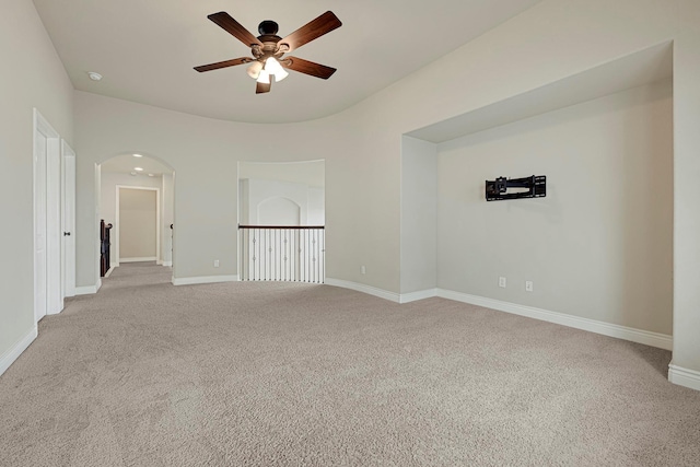 20010 Barrow Edge Ln, Cypress, TX 77433 - carpeted empty room with a ceiling fan and arched walkways