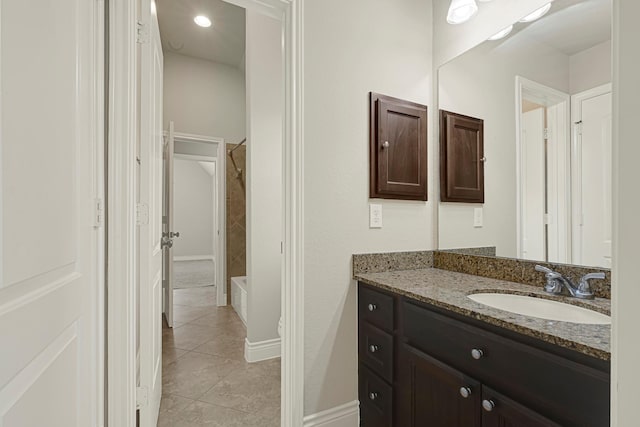 20010 Barrow Edge Ln, Cypress, TX 77433 - bathroom featuring vanity, tile patterned floors, and shower / bathtub combination