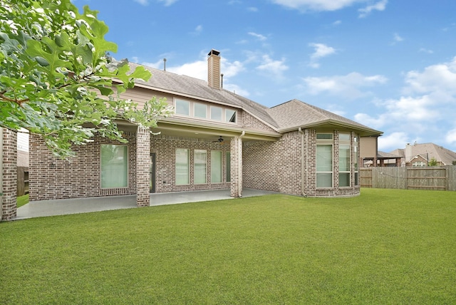 20010 Barrow Edge Ln, Cypress, TX 77433 - back of property with a chimney and brick siding