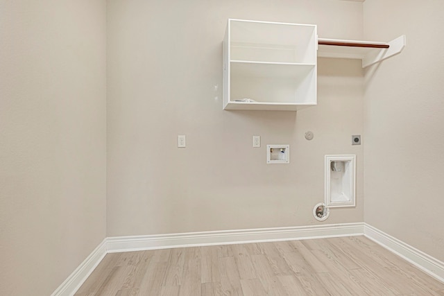 20010 Barrow Edge Ln, Cypress, TX 77433 - laundry room with hookup for a gas dryer, light wood-style flooring, electric dryer hookup, and washer hookup