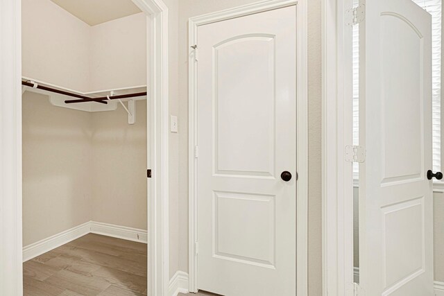 20010 Barrow Edge Ln, Cypress, TX 77433 - spacious closet with wood finished floors