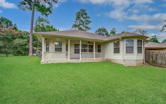 99 E Foxbriar Forest Cir, The Woodlands, TX 77382 - view of front of home featuring a ceiling fan, a chimney, and a porch