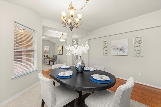 99 E Foxbriar Forest Cir, The Woodlands, TX 77382 - dining space with a chandelier and lofted ceiling