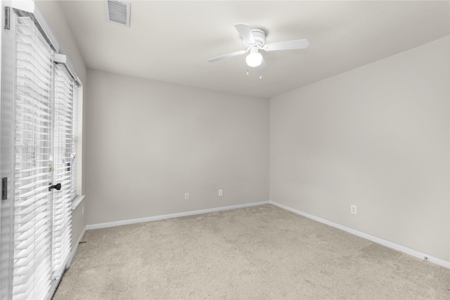 99 E Foxbriar Forest Cir, The Woodlands, TX 77382 - unfurnished bedroom featuring carpet and a ceiling fan