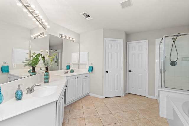 99 E Foxbriar Forest Cir, The Woodlands, TX 77382 - bathroom with double vanity, a bath, tile patterned floors, and a stall shower
