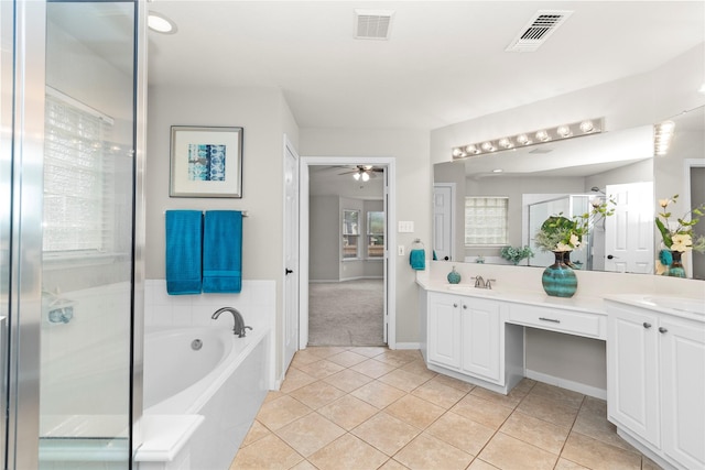 99 E Foxbriar Forest Cir, The Woodlands, TX 77382 - full bathroom featuring double vanity, plenty of natural light, a bath, and tile patterned floors