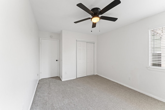 16323 Tiburon Way, Houston, TX 77053 - unfurnished bedroom featuring carpet floors, a closet, and a ceiling fan