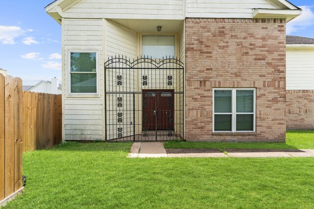 16323 Tiburon Way, Houston, TX 77053 - entrance to property with a gate and brick siding