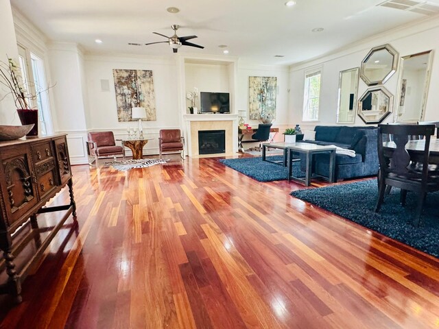 1812 Prospect St, Houston, TX 77004 - living room with a fireplace, wood finished floors, ceiling fan, recessed lighting, and ornamental molding