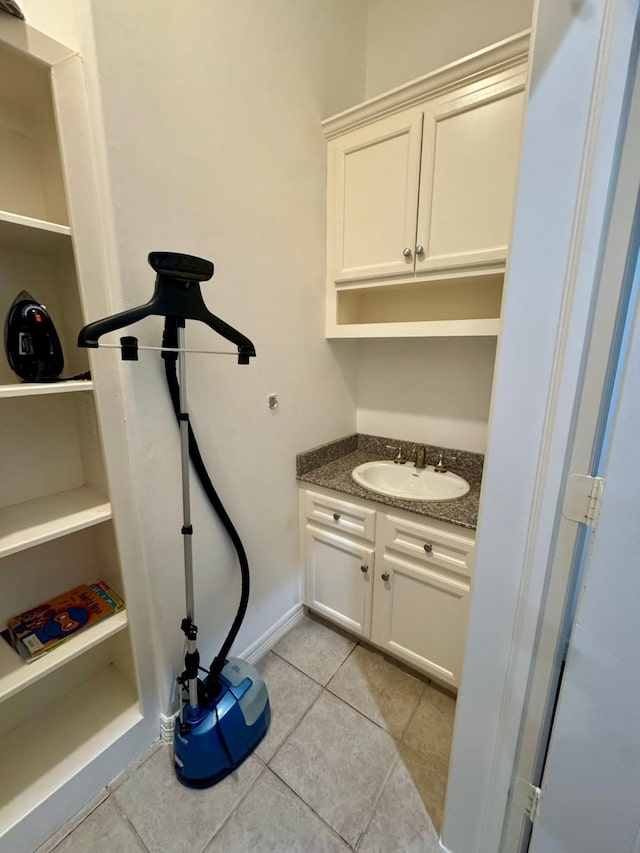 1812 Prospect St, Houston, TX 77004 - bathroom featuring tile patterned floors and vanity