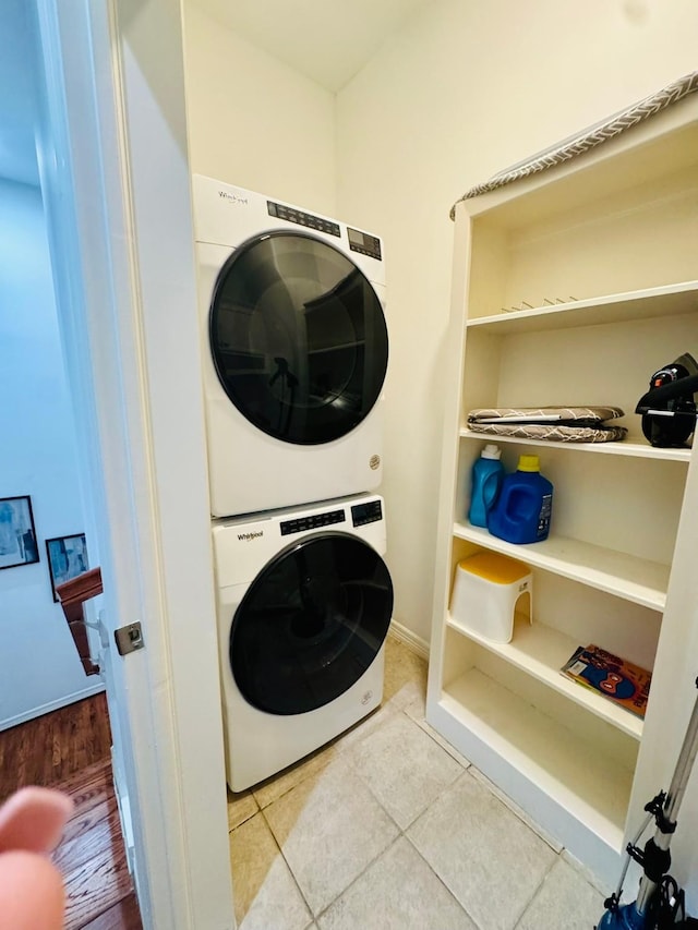1812 Prospect St, Houston, TX 77004 - laundry room with estacked washer and dryer and tile patterned floors
