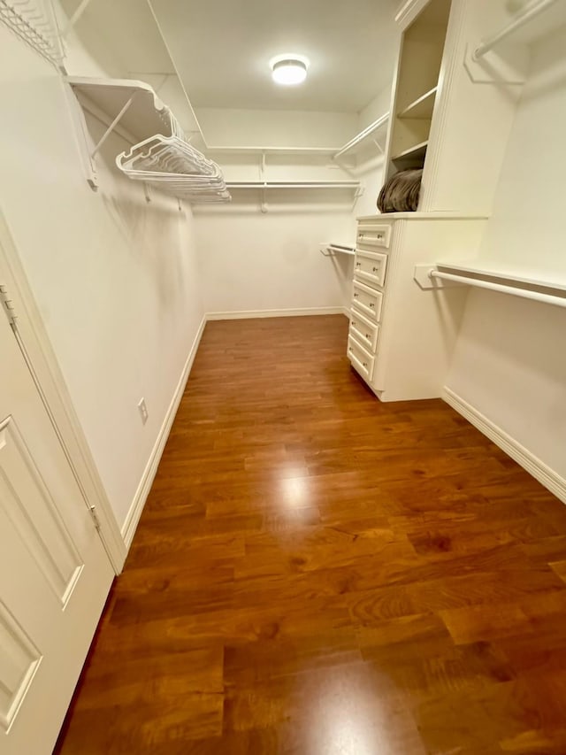 1812 Prospect St, Houston, TX 77004 - spacious closet featuring dark wood-style floors