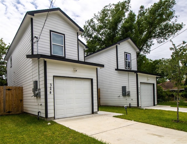 324 Gans St Unit B, Houston, TX 77029 - view of front of property featuring driveway and a garage