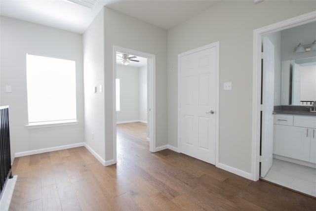 324 Gans St Unit B, Houston, TX 77029 - hall with wood finished floors and baseboards