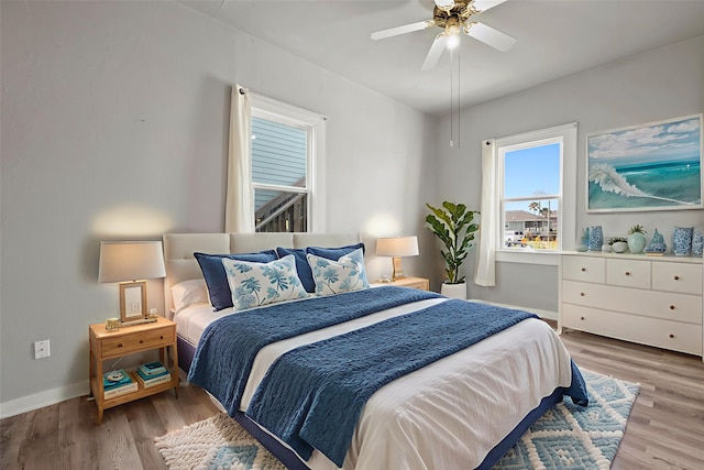 2714 Ball St, Galveston, TX 77550 - bedroom with wood finished floors and a ceiling fan