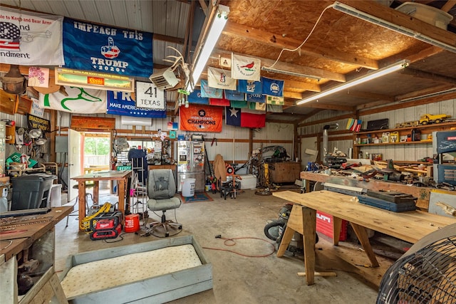 15631 Fir Rd, Santa Fe, TX 77517 - garage featuring a workshop area