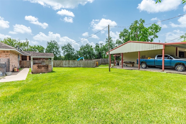 15631 Fir Rd, Santa Fe, TX 77517 - view of yard featuring a detached carport
