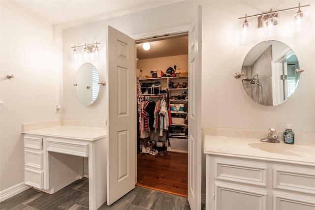15631 Fir Rd, Santa Fe, TX 77517 - full bath with vanity, wood finished floors, and a walk in closet