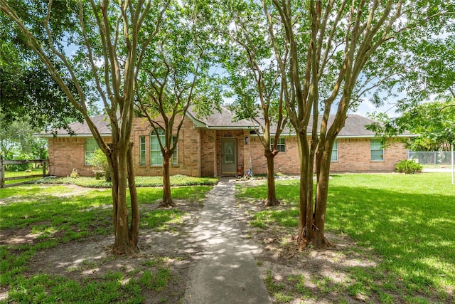15631 Fir Rd, Santa Fe, TX 77517 - ranch-style house featuring brick siding and roof with shingles