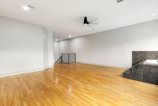 1020 Columbus St, Houston, TX 77019 - unfurnished room featuring light wood-style floors, ceiling fan, and recessed lighting