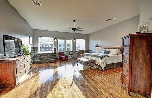 1020 Columbus St, Houston, TX 77019 - bedroom featuring light wood-type flooring, a ceiling fan, and lofted ceiling