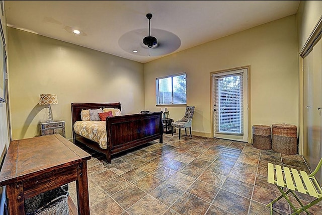 1020 Columbus St, Houston, TX 77019 - bedroom featuring dark stone finish floors, a ceiling fan, recessed lighting, and access to outside