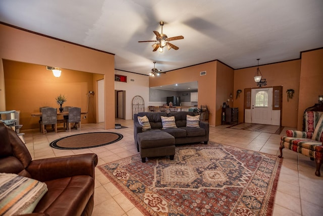 925 Royal Rd, Port Lavaca, TX 77979 - living room with tile patterned flooring, a ceiling fan, and ornamental molding