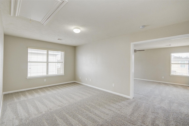 7255 Liberty Mesa Ln, Houston, TX 77049 - carpeted empty room with attic access and a smoke detector