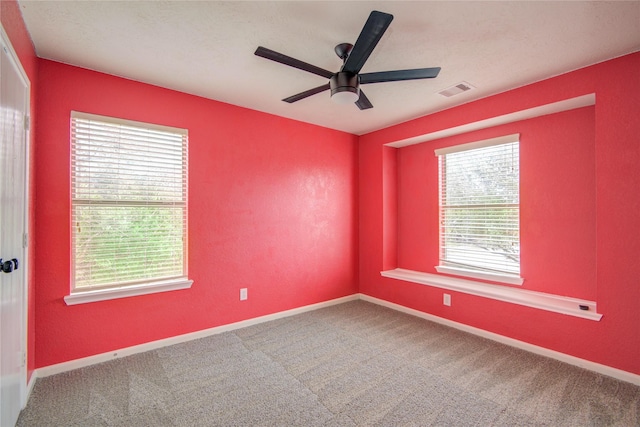 7255 Liberty Mesa Ln, Houston, TX 77049 - carpeted spare room featuring healthy amount of natural light and a ceiling fan