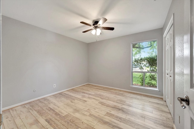 15707 Spring Forest Dr, Houston, TX 77059 - empty room with a ceiling fan and light wood-style flooring