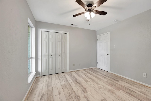 15707 Spring Forest Dr, Houston, TX 77059 - unfurnished bedroom with light wood-style flooring, a closet, and ceiling fan