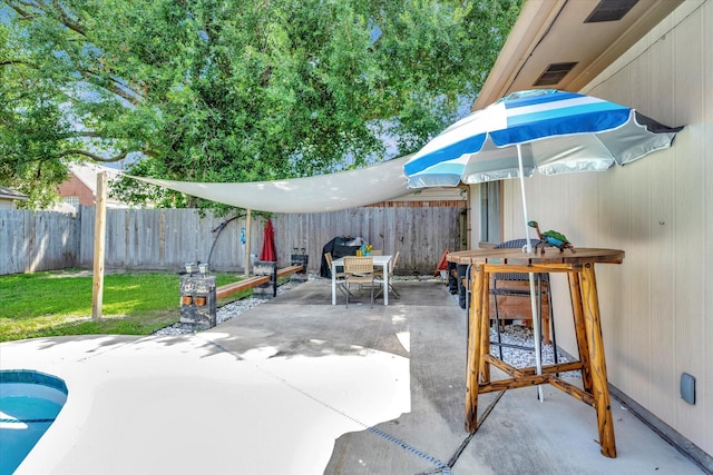 15707 Spring Forest Dr, Houston, TX 77059 - fenced backyard featuring outdoor dining space and a patio