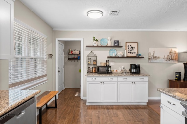 32047 S Wiggins St, Magnolia, TX 77355 - kitchen with dishwasher, open shelves, dark wood-style flooring, white cabinets, and ornamental molding